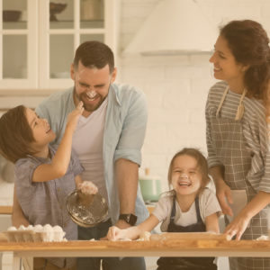 Young family celebrating national parents day.