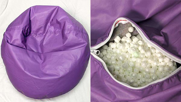 Purple beanbag chair unzipped show suffocation-causing foam beads.