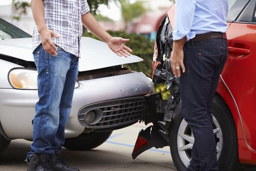 two drivers discussing about a car accident outside