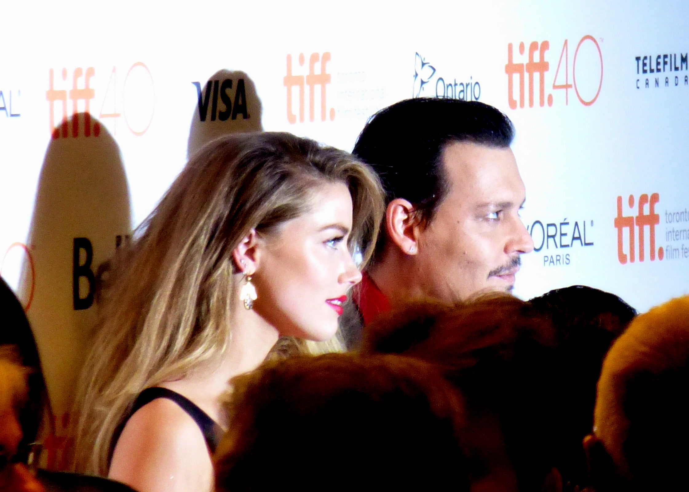 Amber Heard and Johnny Depp on the red carpet of a Film Festival