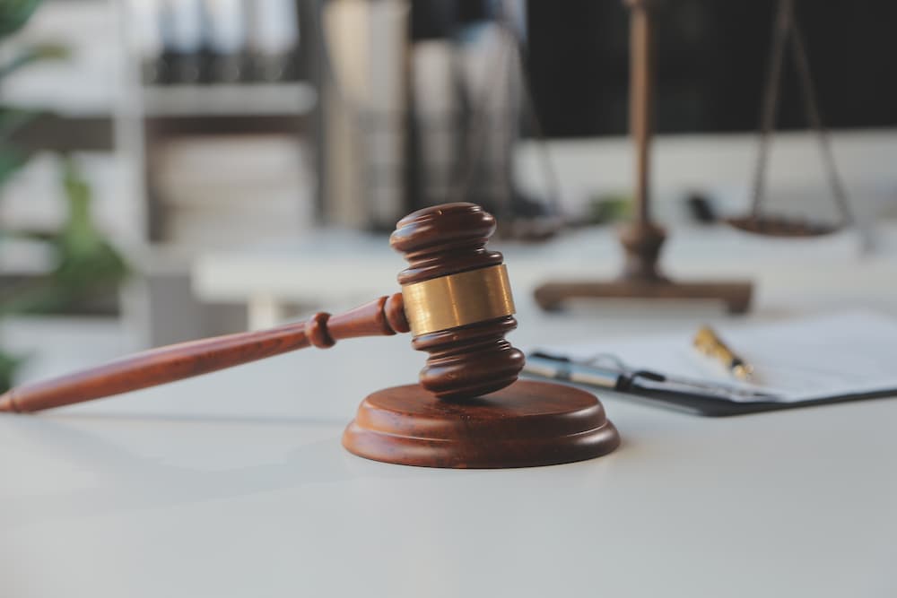 Legal imagery used by a Kentucky car accident attorney to discuss state auto insurance laws and the no-fault system.