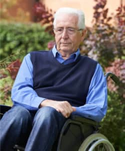 male nursing home patient in wheelchair