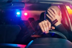 man being pulled over for drinking and driving